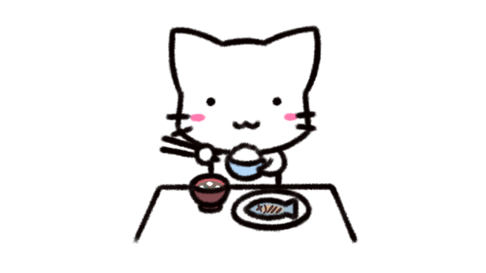 お箸でご飯を食べるねこ