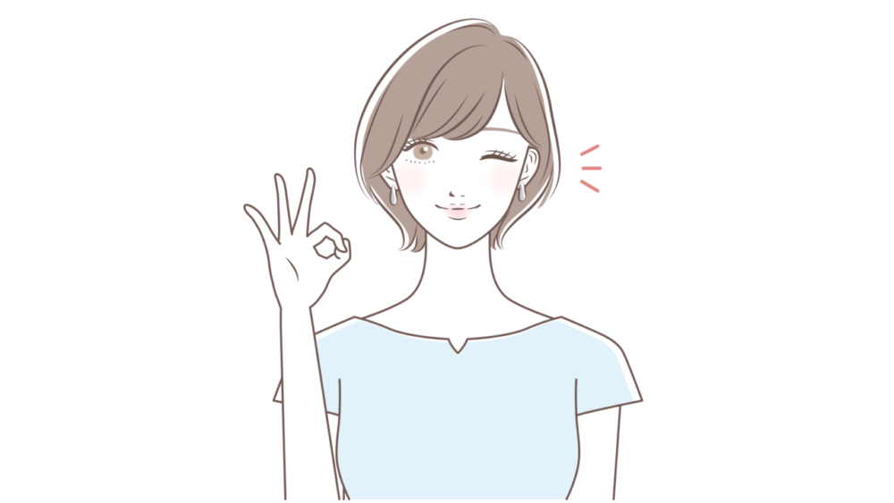 ウインクをしてokポーズをする女性