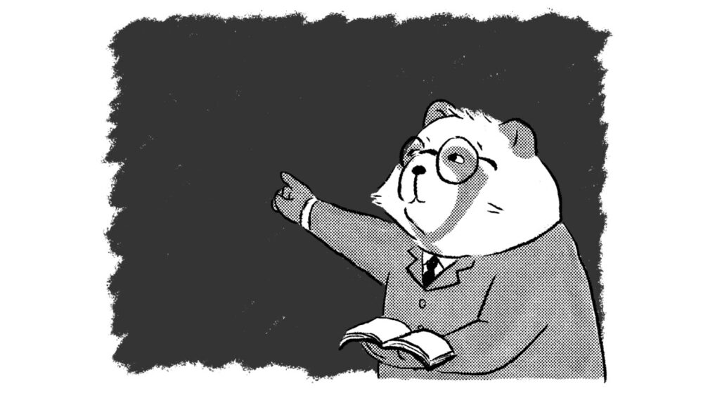 メガネをかけたクマと黒板